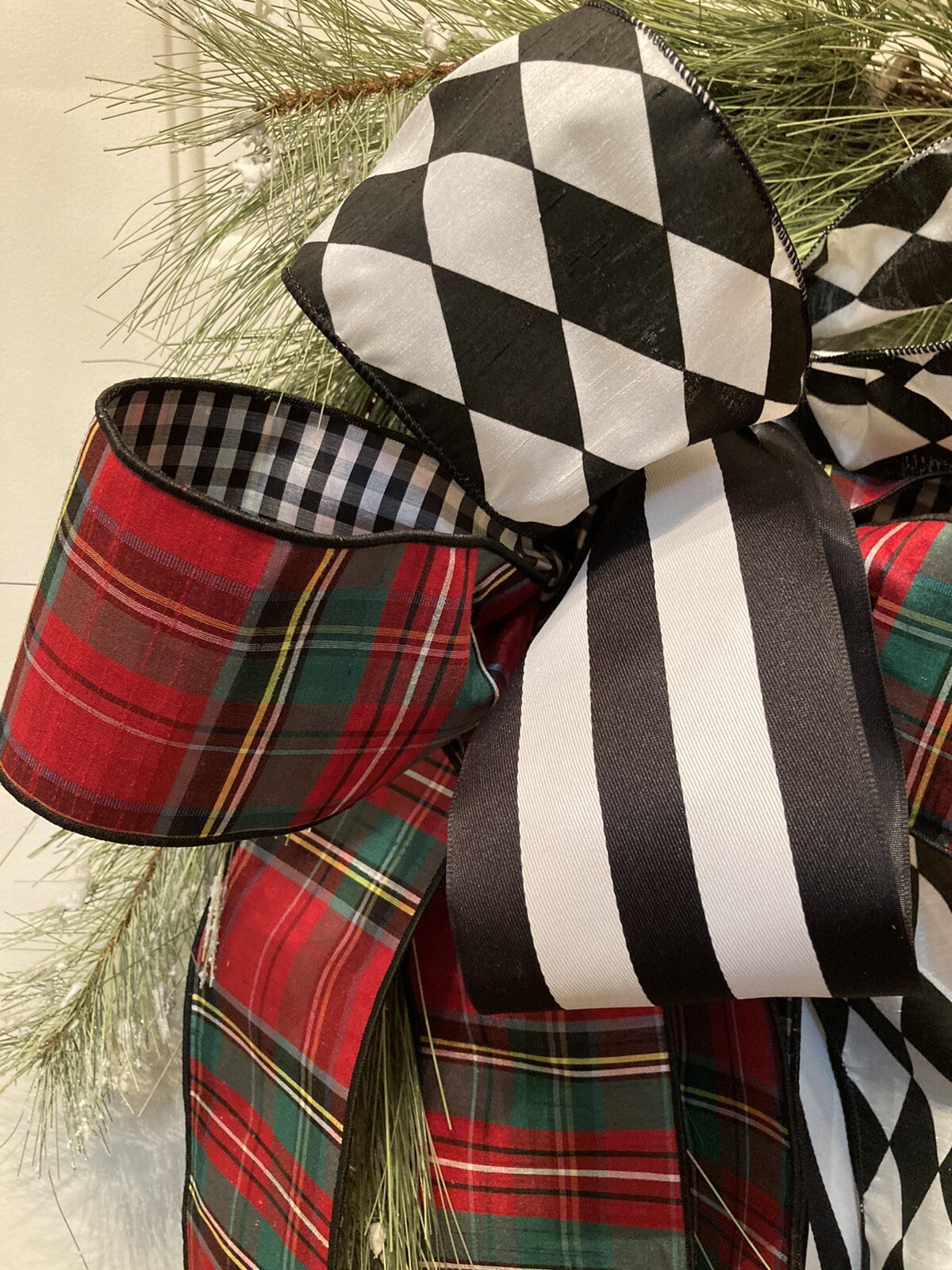 Long Snowy Needled Pine Wreath Wrapped In Exquisite Ribbon