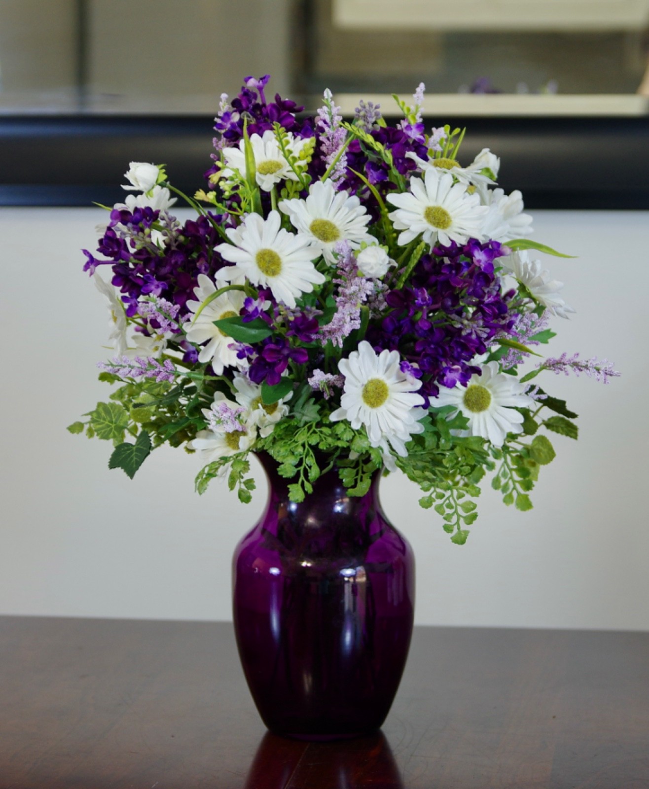 Silk Purple Lilacs and White Daisies Arrangement in a Purple Glass Vase