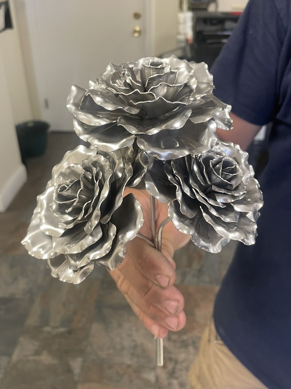 Metal Rose Flowers, handcrafted, bent, and welded. $15/Rose.
