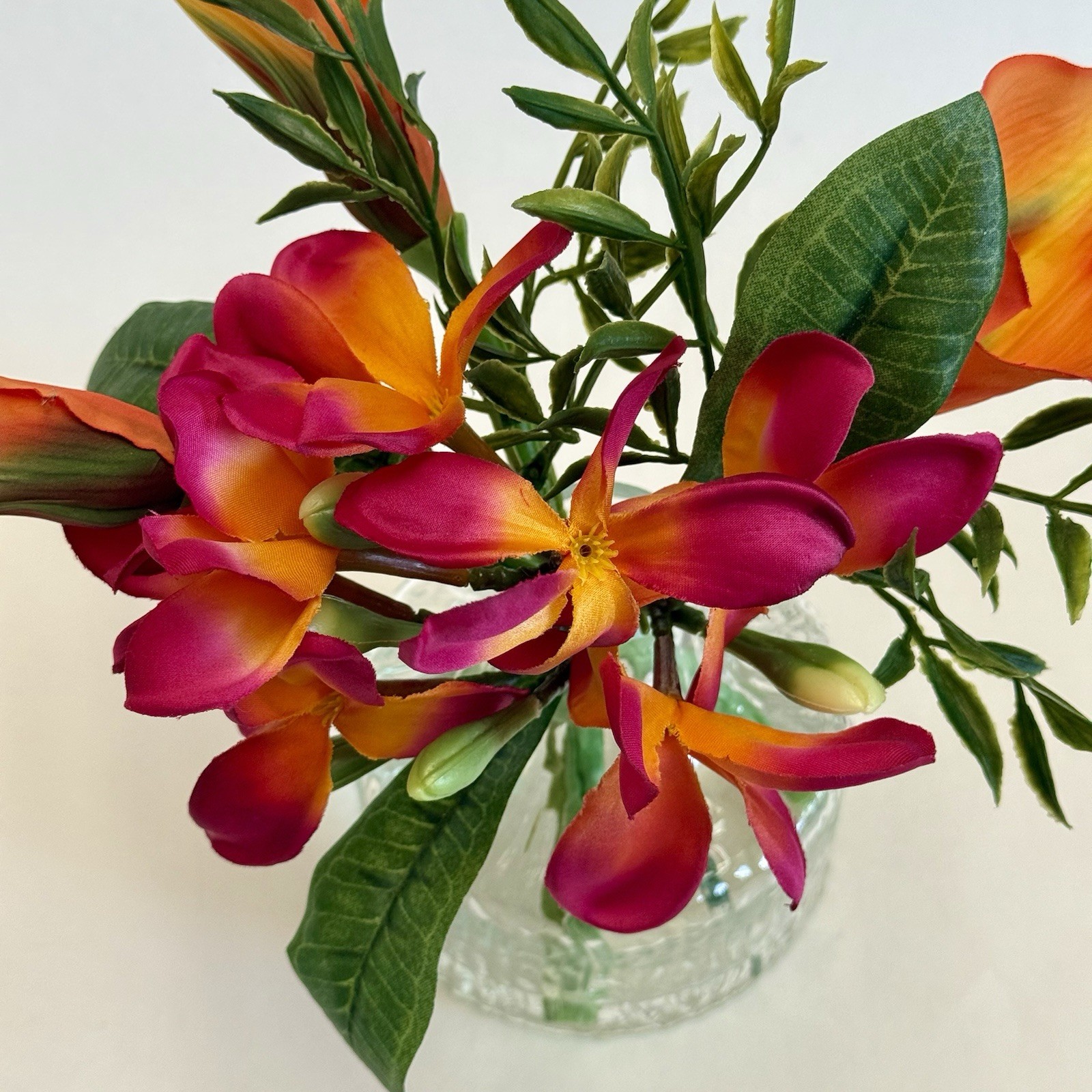 Artificial Tropical Flower Arrangement in Textured Glass Vase Pink Orange 10”