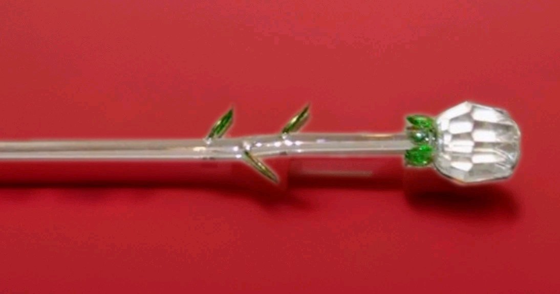 8 pc Hand blown Glass Roses with delicate green leaves on long stem.