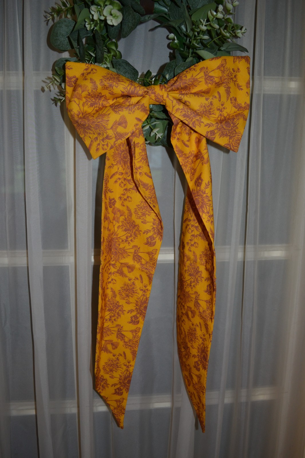 Wreath Sash with bow is Made In A Sunflower Toile Cotton Fabric Yellow In Color