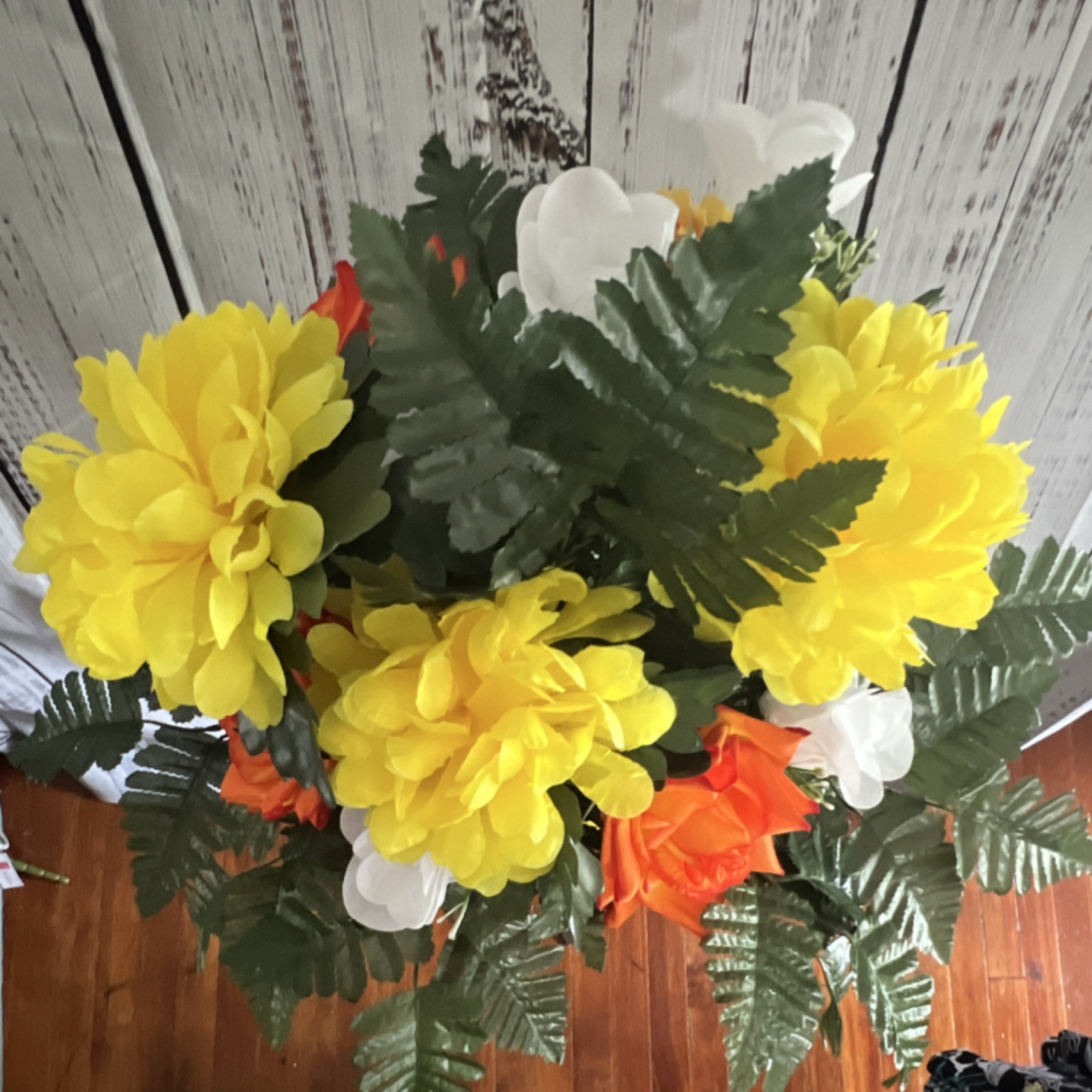 Cemetery vase insert with yellow, orange, white, and green florals