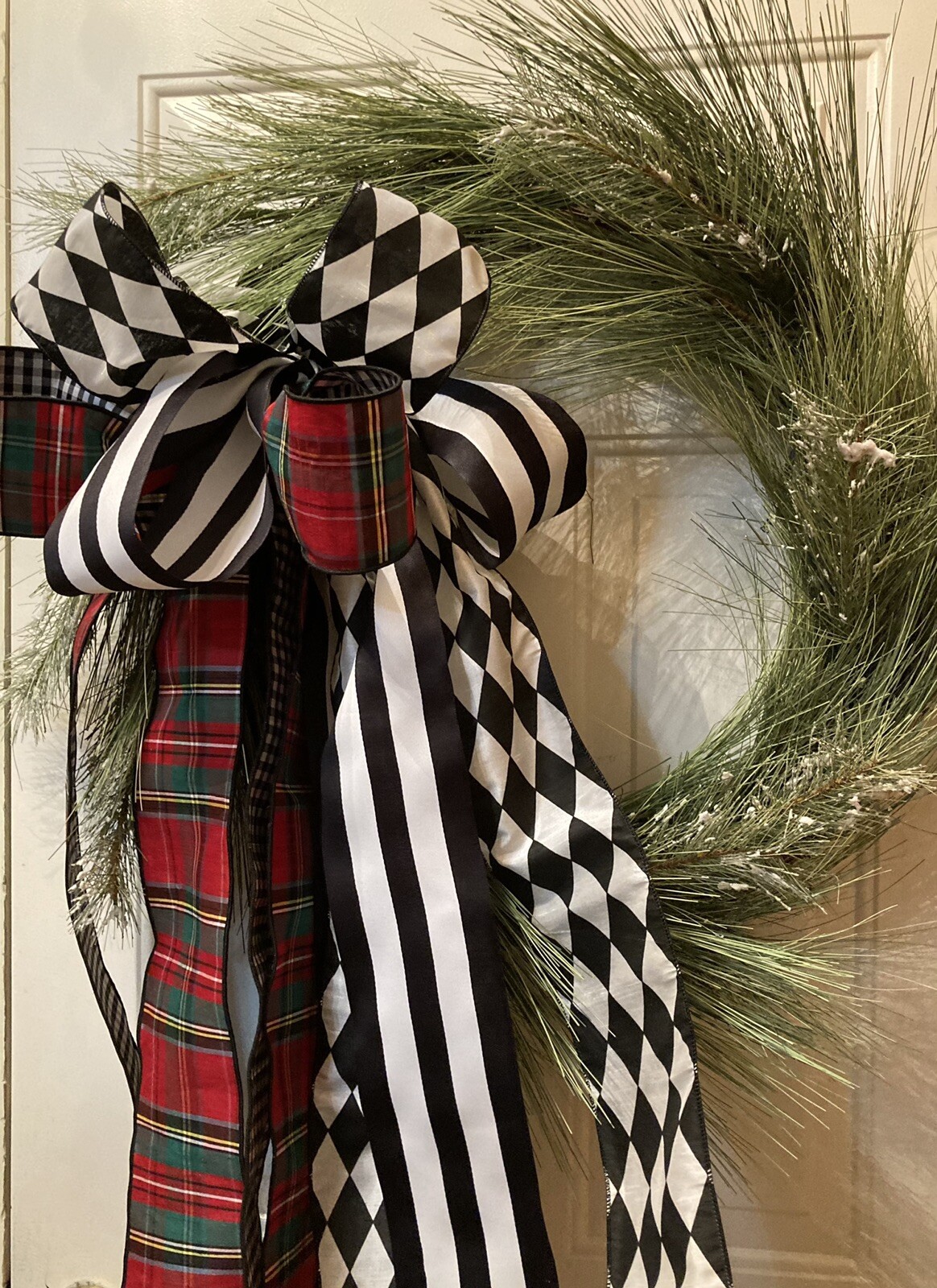 Long Snowy Needled Pine Wreath Wrapped In Exquisite Ribbon