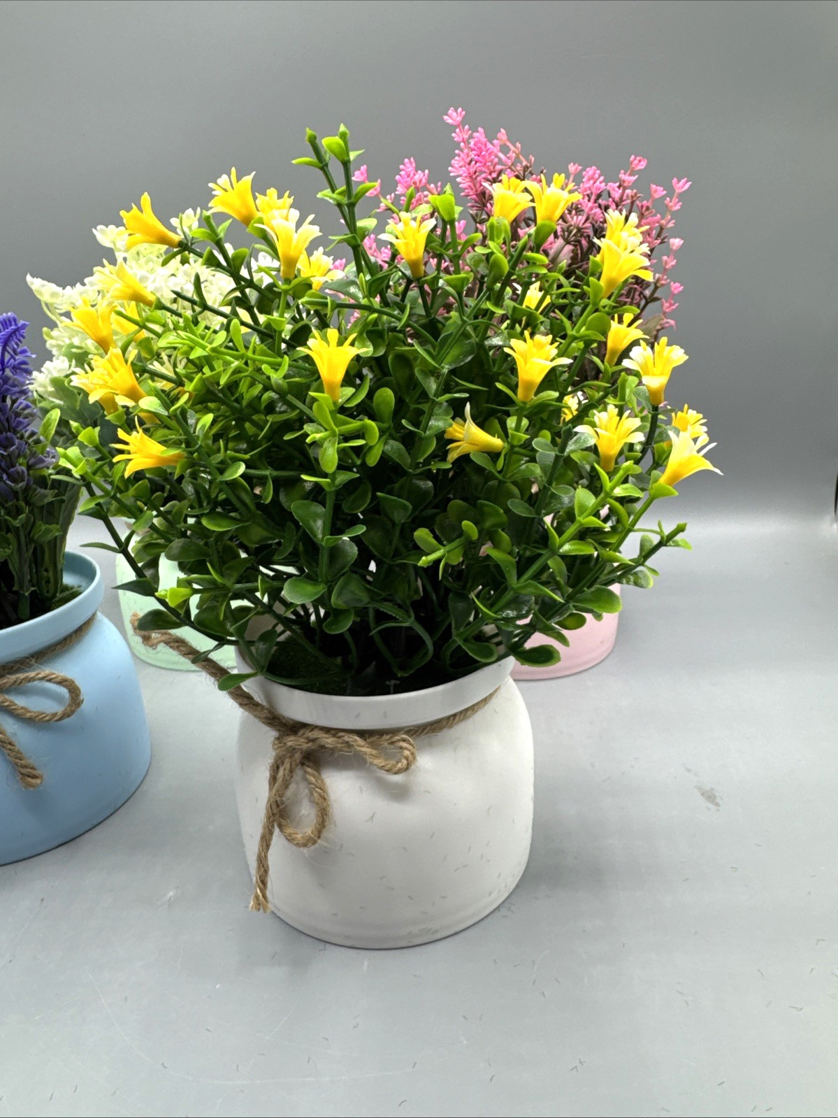 4 Pack Fake Flowers Small Artificial Faux Plants in Plastic Macaron Pots