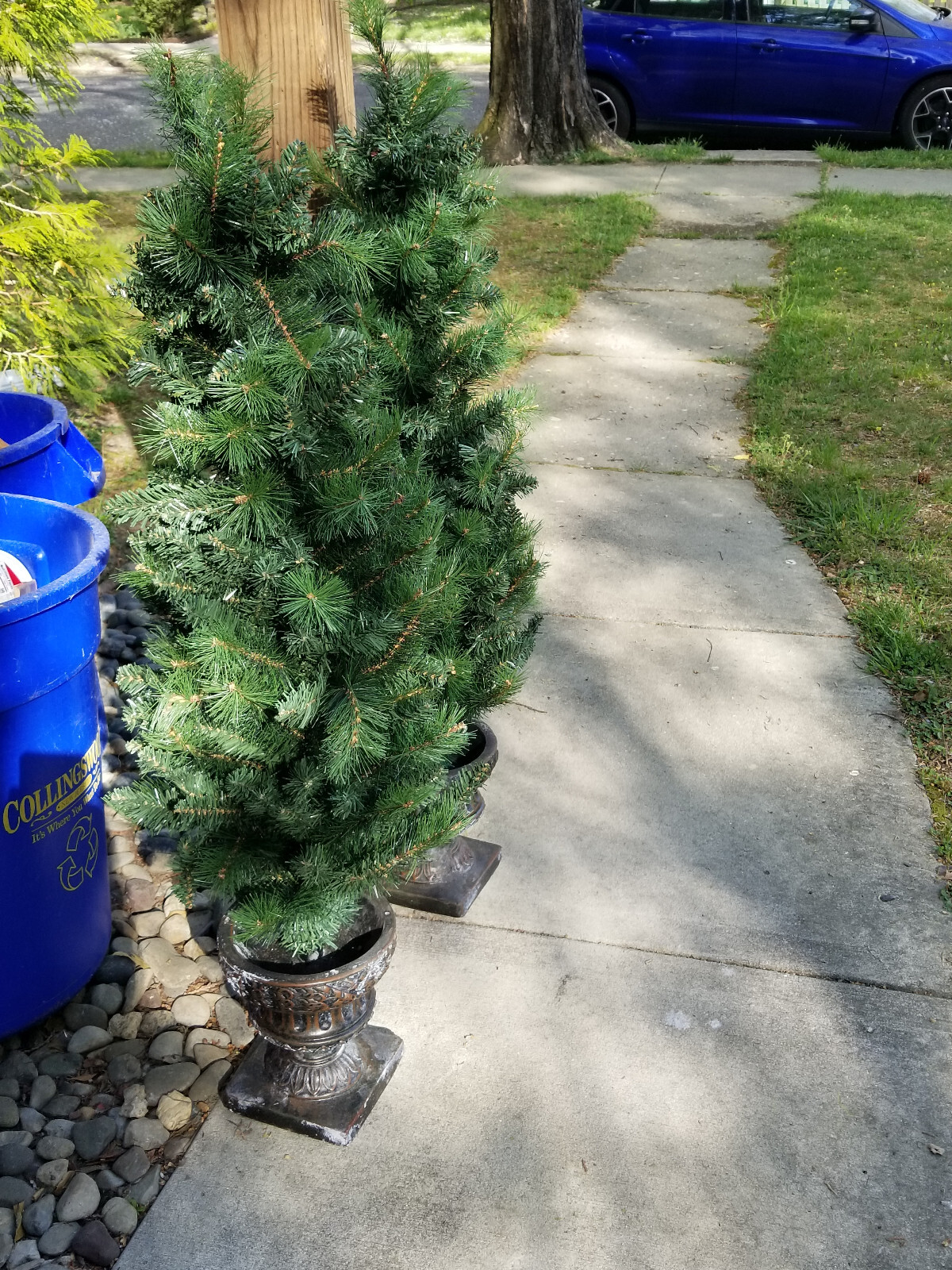 A PAIR OF DECRATIVE ARTIFICIAL FAUX POTTED PORCH PINE PLANTS 4′