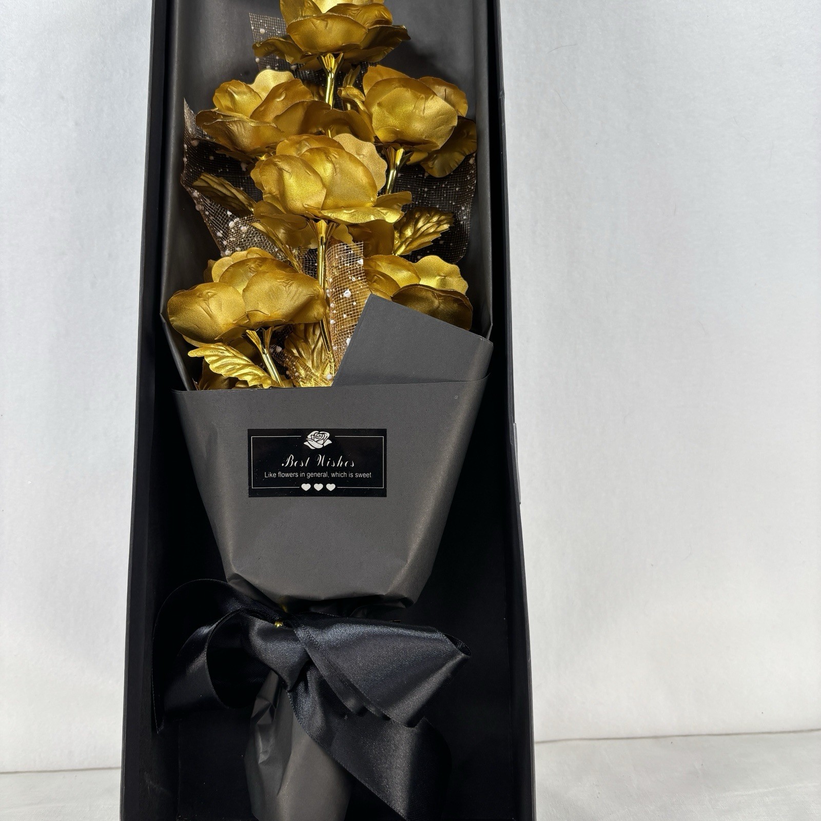 Gold-plated artificial rose bouquet in a black gift box