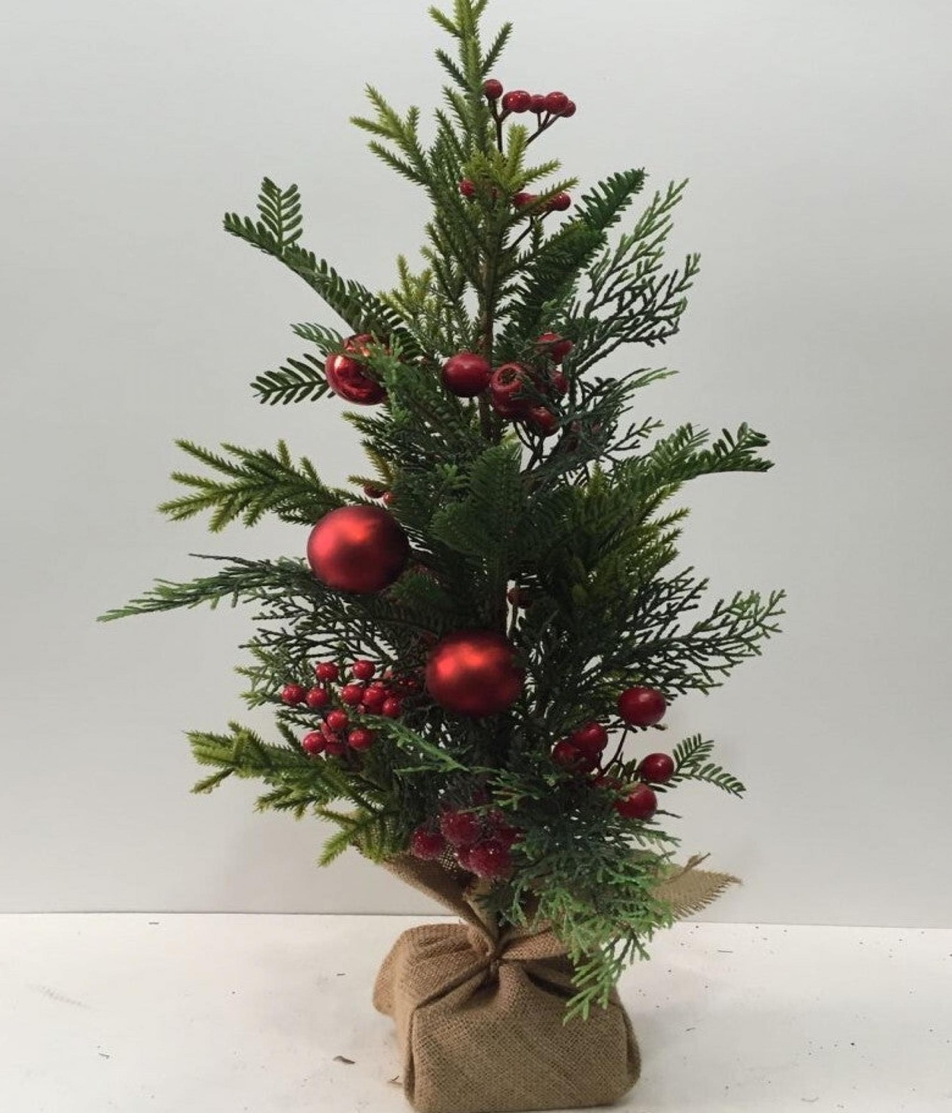 Green Pine With Red Berries And Balls In A Pot Faux Plants And Trees