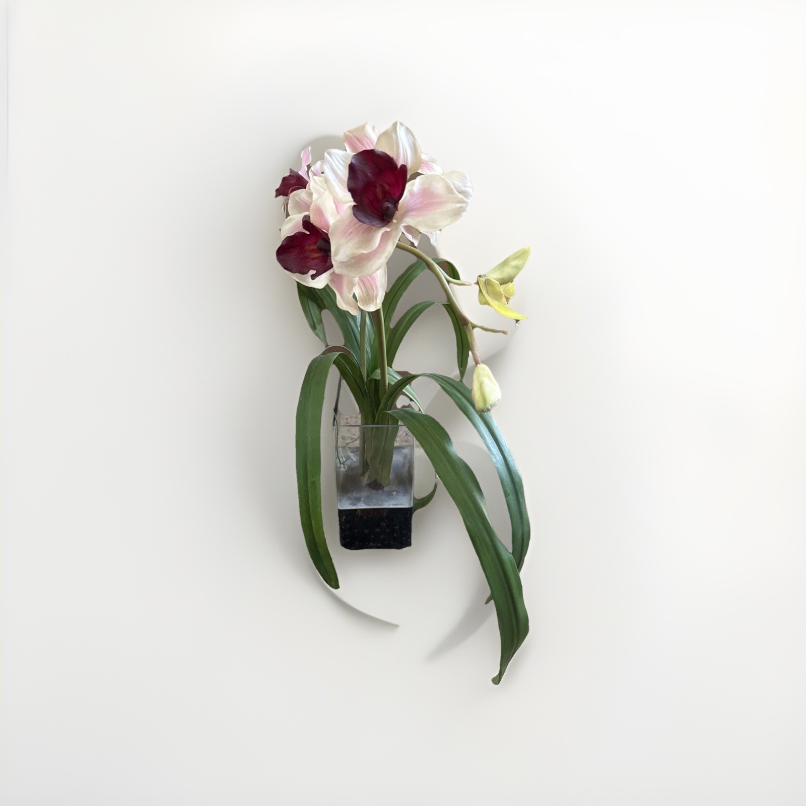 Fake Orchids In Glass Vase With Wire Inside Leaves For Posing