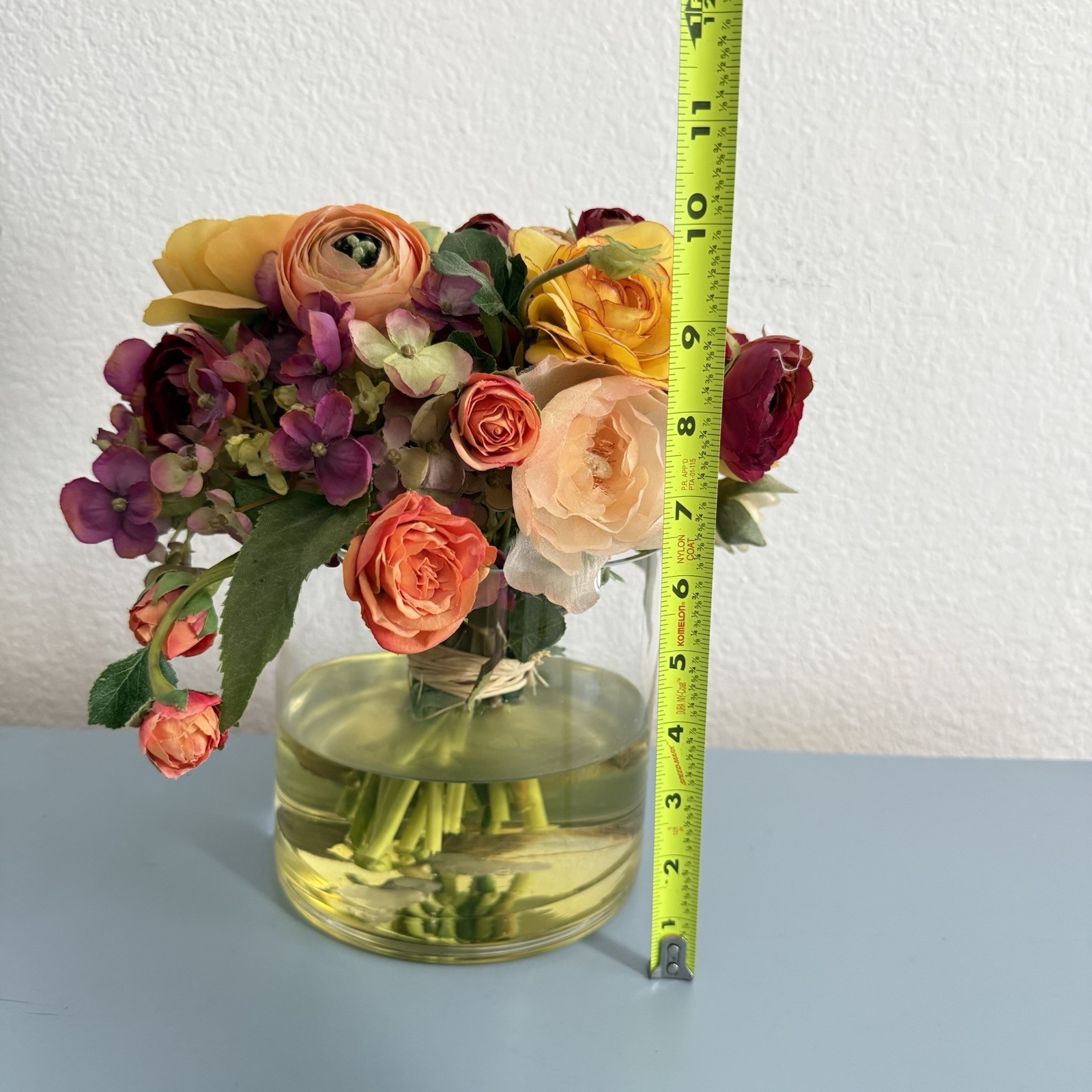 Beautiful Flower Arrangement in Glass Vase with Faux Water.