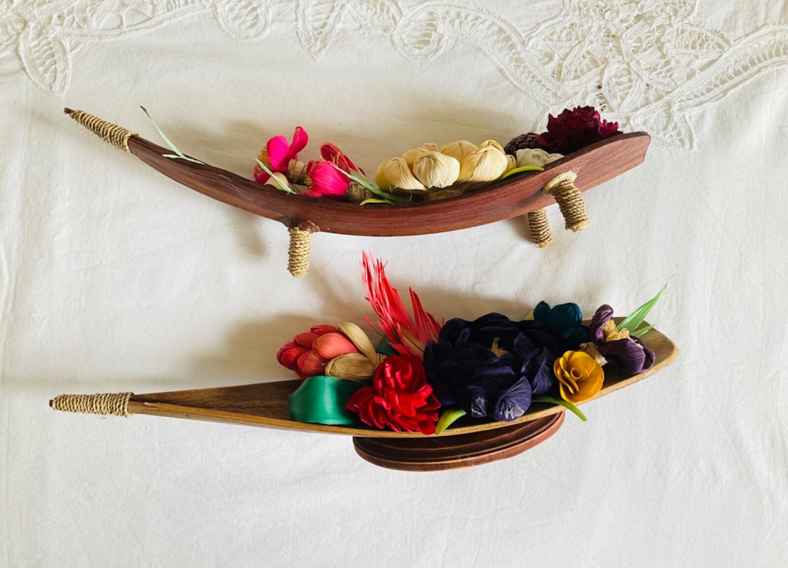 flower arrangements. Coconut spathe vase, dried corn husks, naturals.