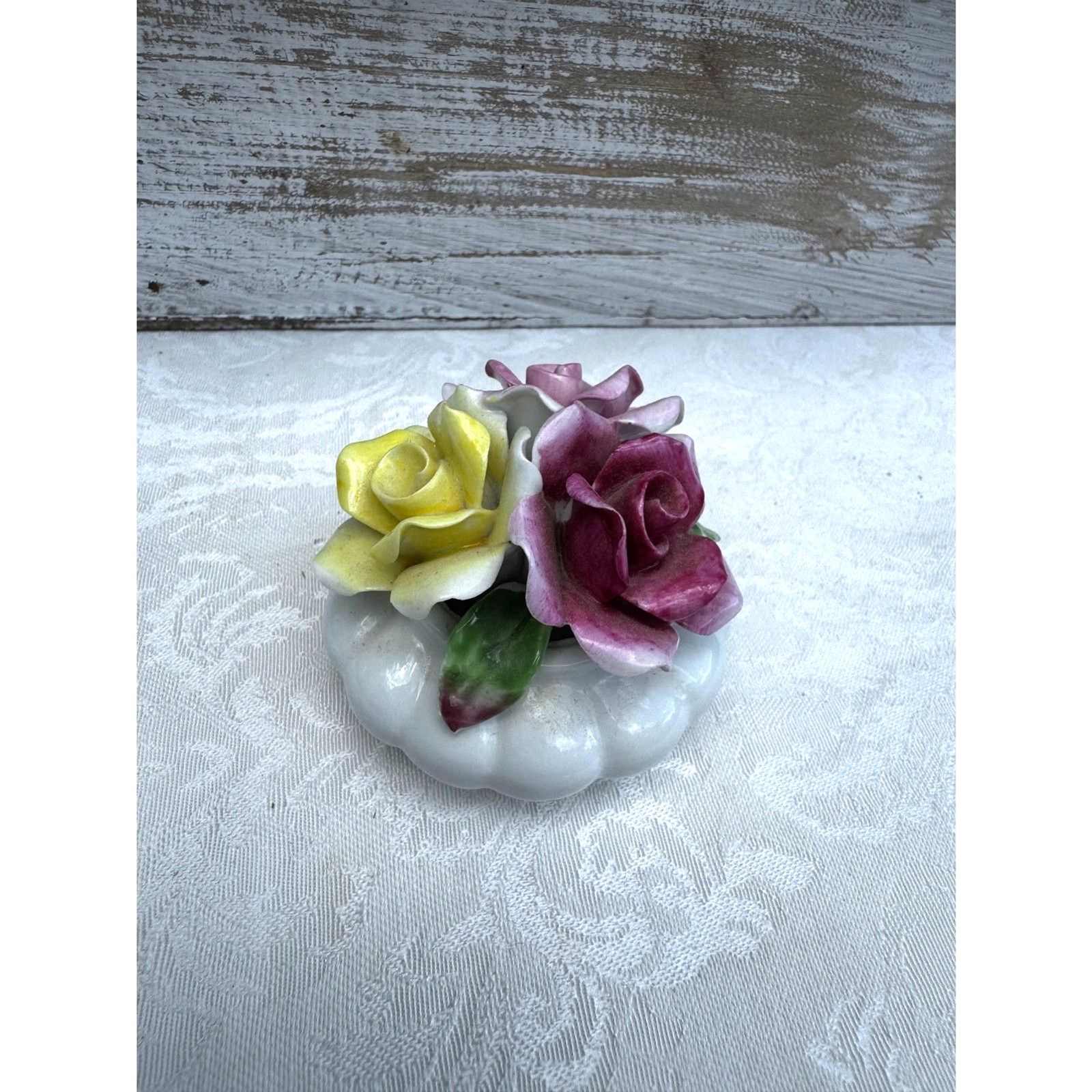 Beautiful vintage bone china flowers in tiny vase red, yellow, pink roses
