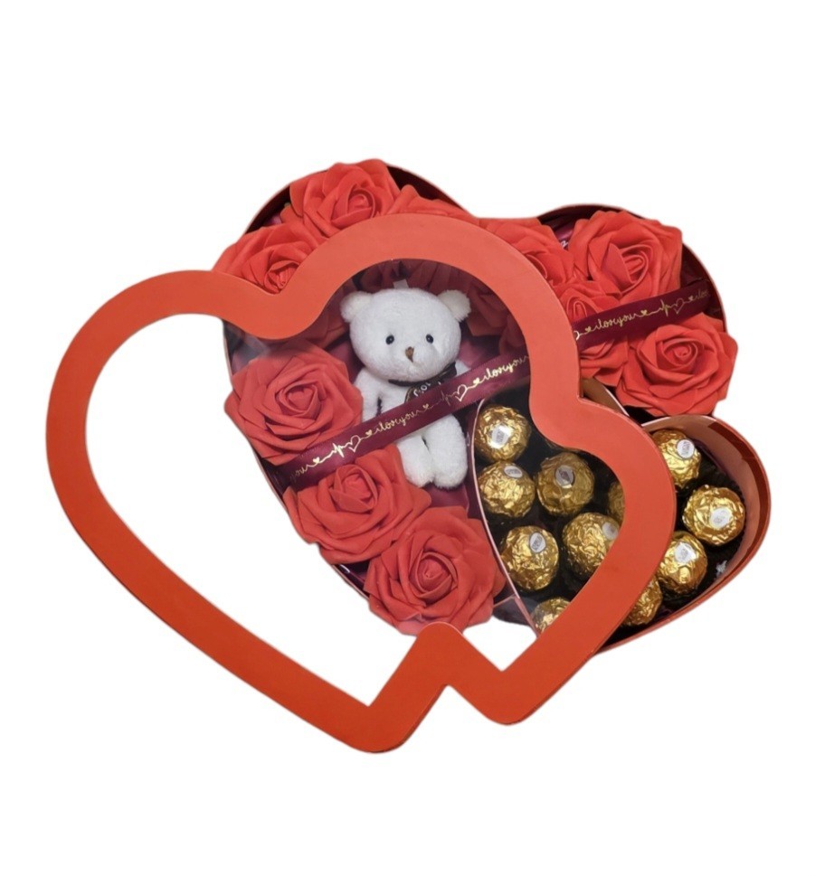 Eternal red flowers with a box in the shape of a red heart, chocolate/bear.