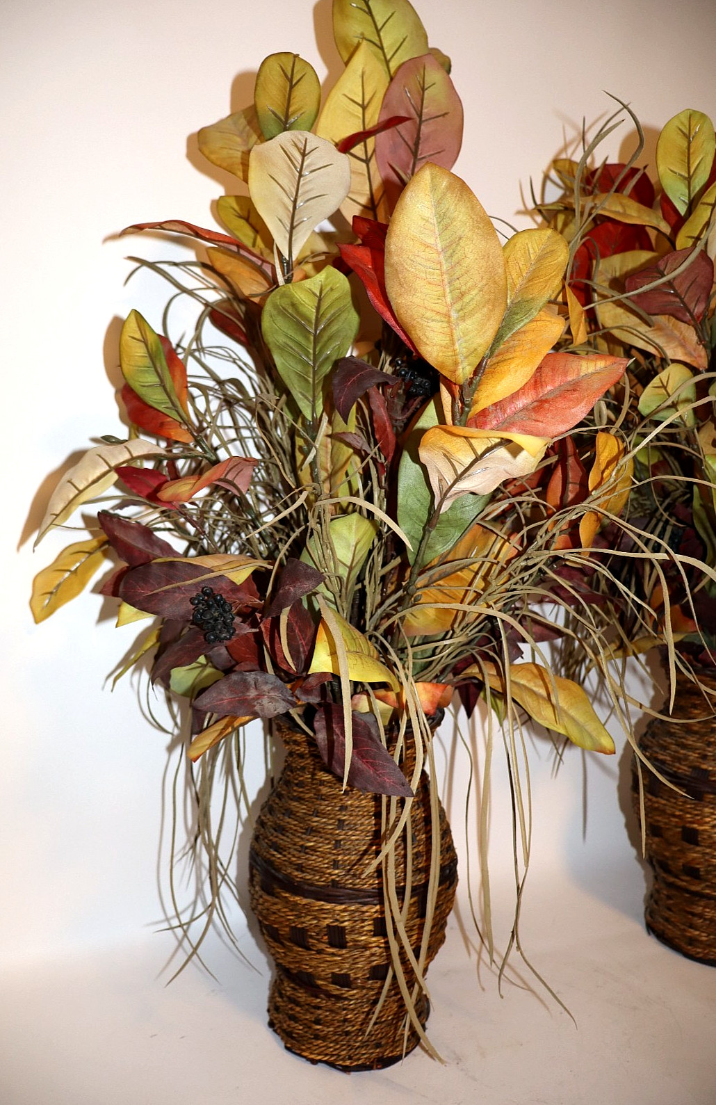 Pair of High Quality 30″ tall Faux Foliage Arrangements in Woven Pottery Vases