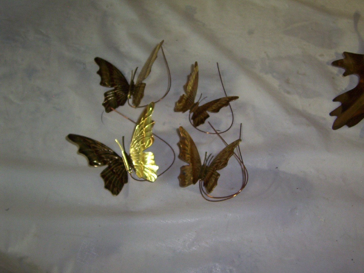 6 BRASS LEAVES AND 4 BRASS BUTTERFLIES
