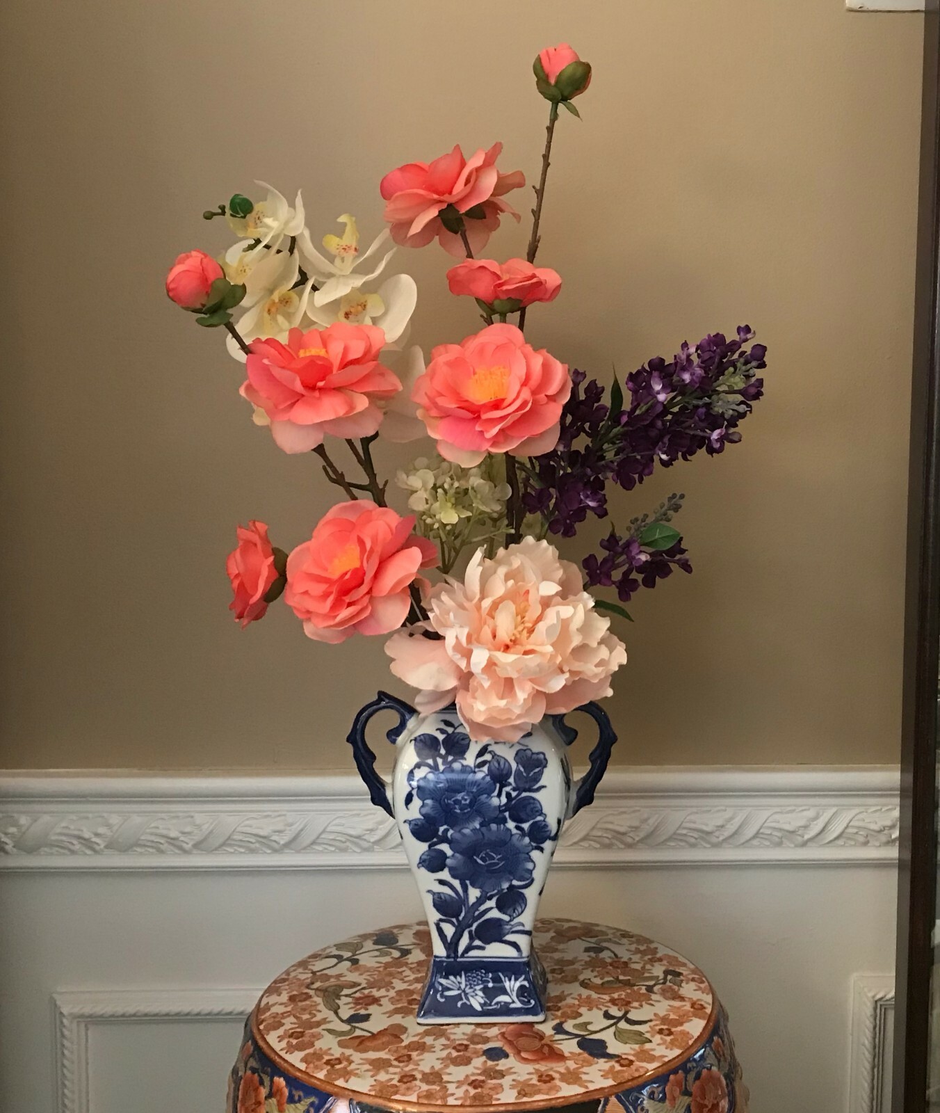 Floral Arrangement with Multi-Colored Silk Flowers in a Blue and White Floral Va