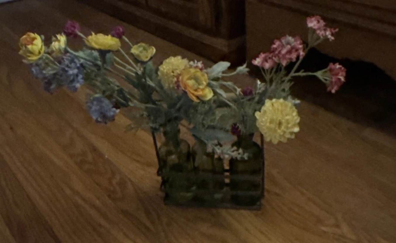 Multicolor Flower Arrangement in Green Glass Bottles with Metal Holder