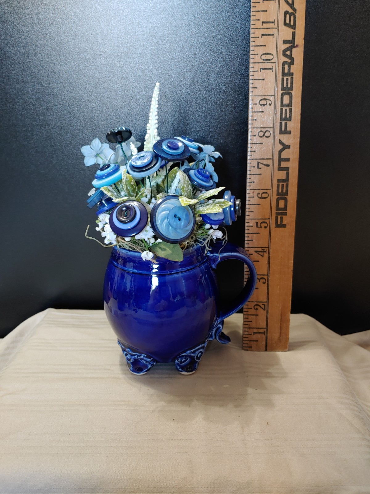 blue and white button bouquet in David Austin Coffee Mug. tiny chips-see pics