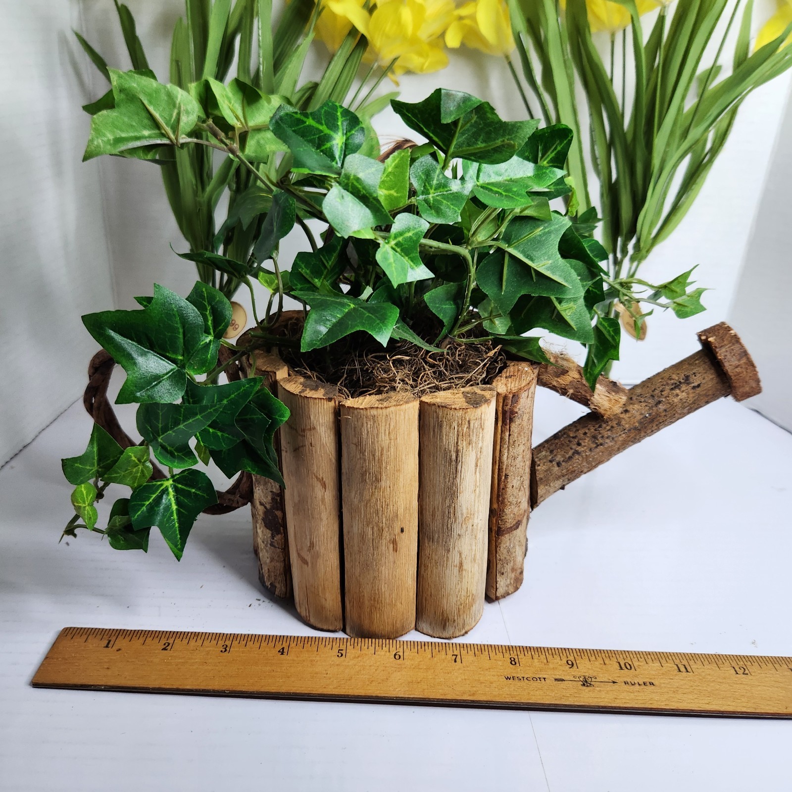 Vintage World Bazaar Faux Daffodil Flowers Rustic Log Watering Can Planter Decor
