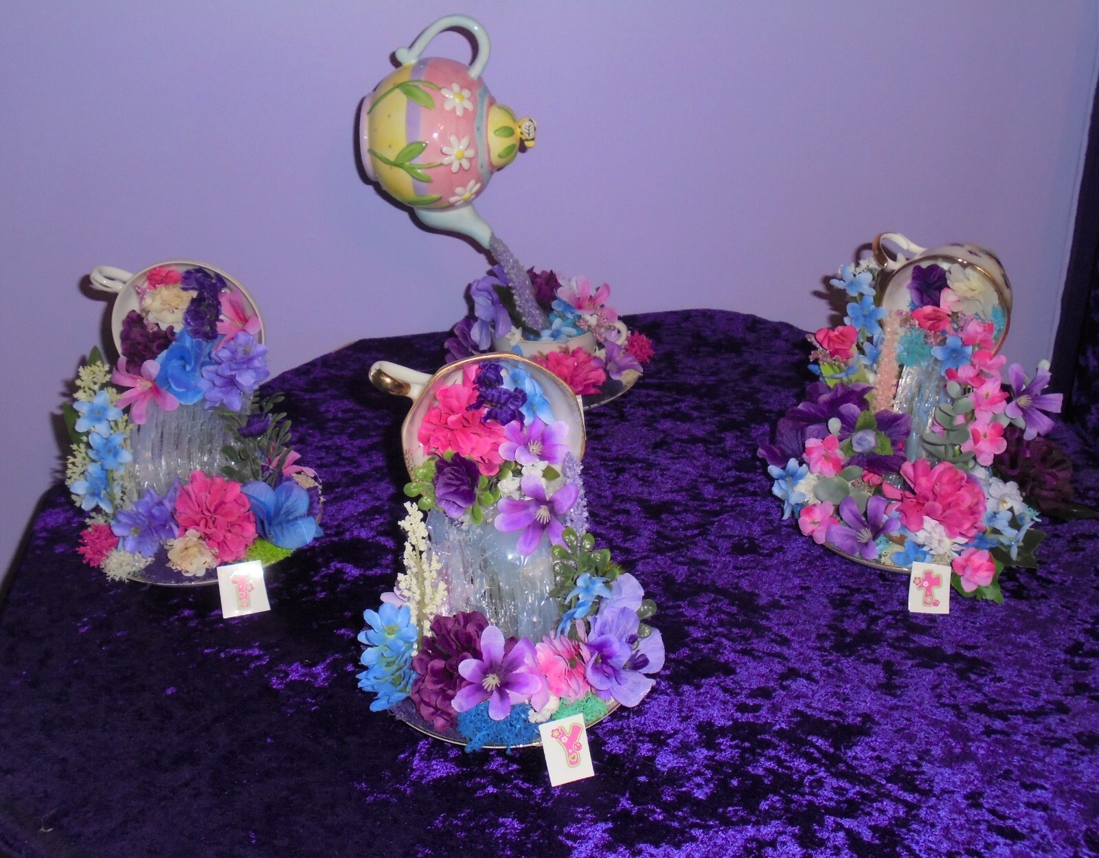 Floating Teacup floral arrangement Item # Y 