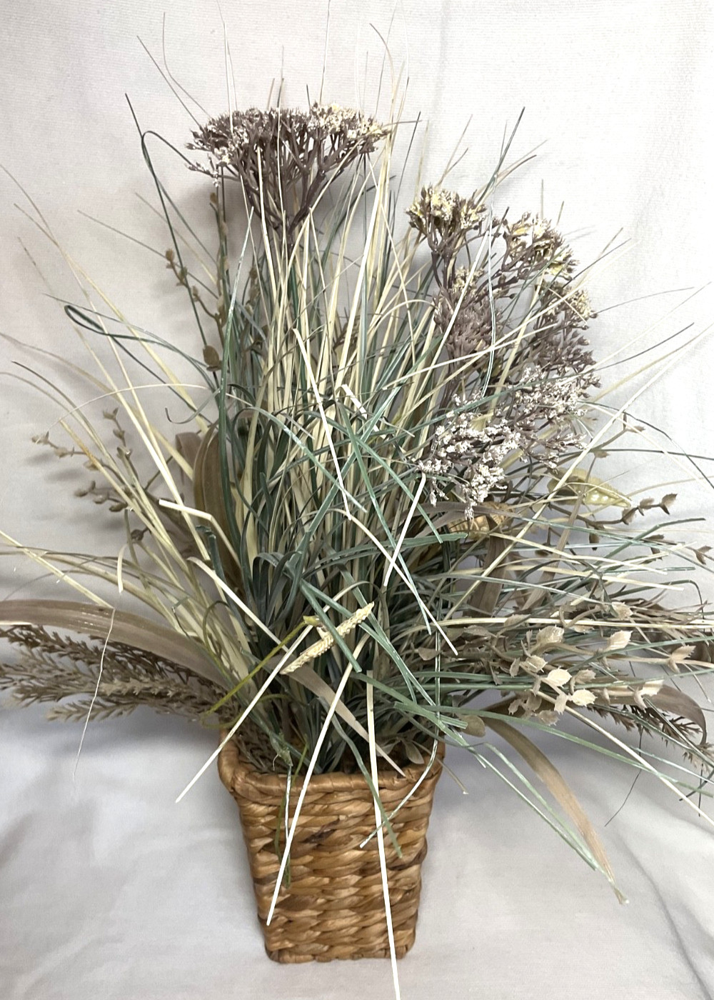 3333333M3ed3333ium Size 33333Woven Basket of Dried Foliage and Shells. 19″ Tall.