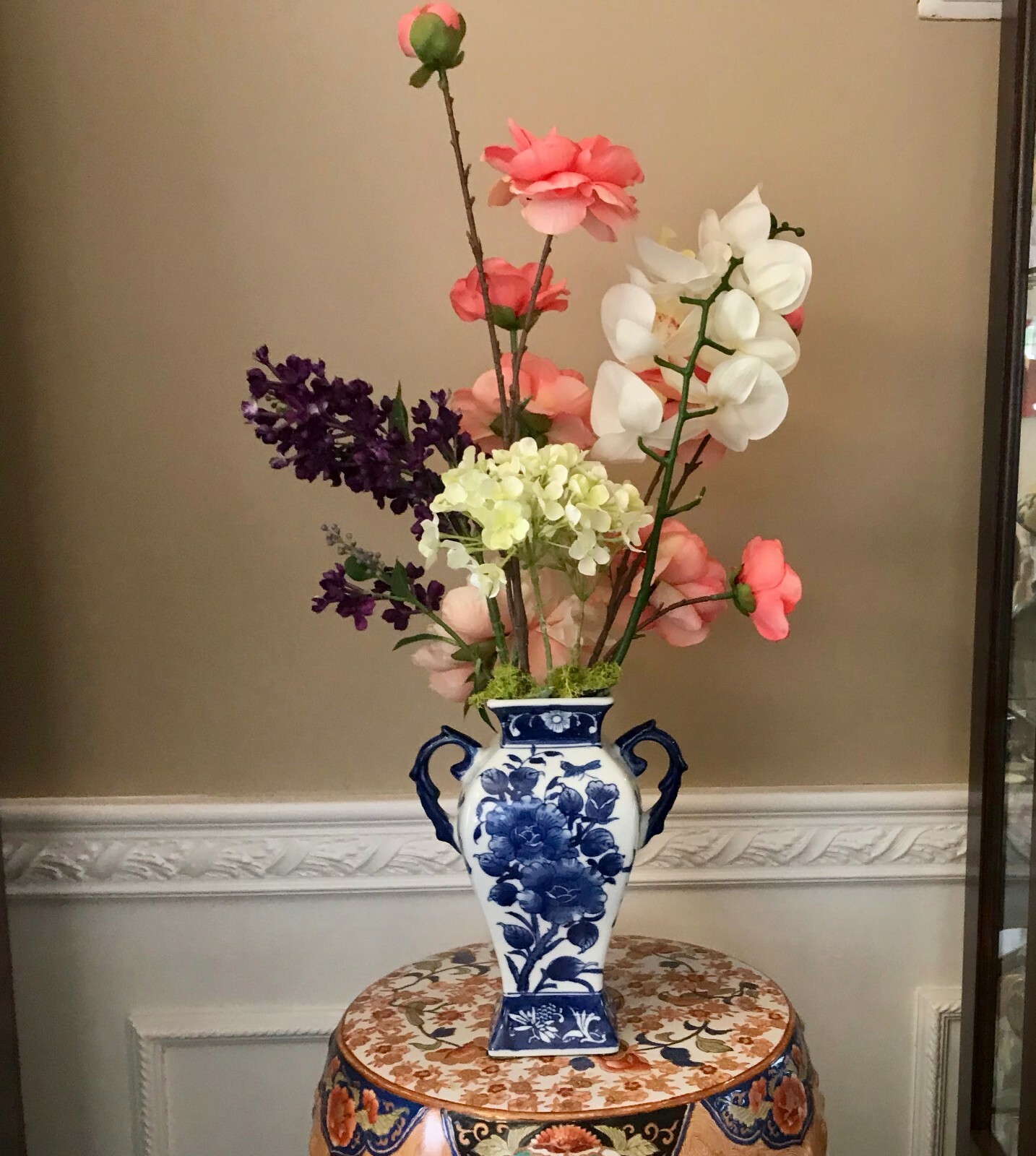 Floral Arrangement with Multi-Colored Silk Flowers in a Blue and White Floral Va