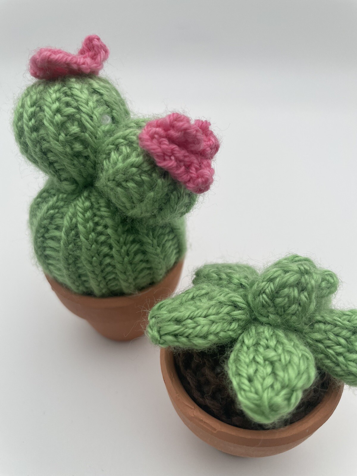 Two Small Knit Cactus Potted Plants Pink & Green In Small Terracotta Pots