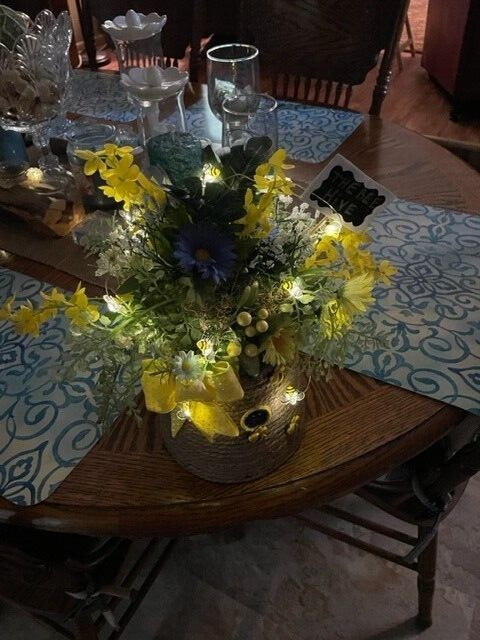 Hand made bee hive flower, with bees that light up, battery is included.
