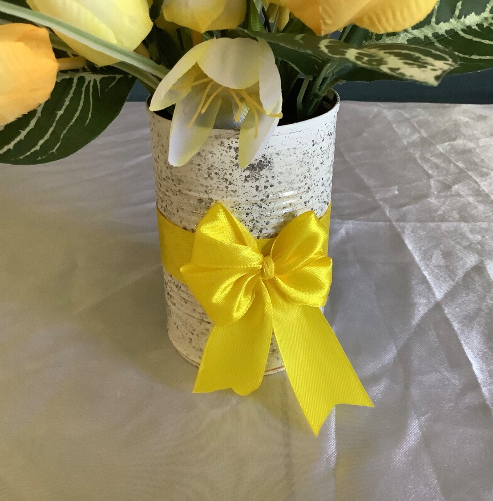 Spring/easter yellow tulip centerpiece with glitter and painted upcycled tin can