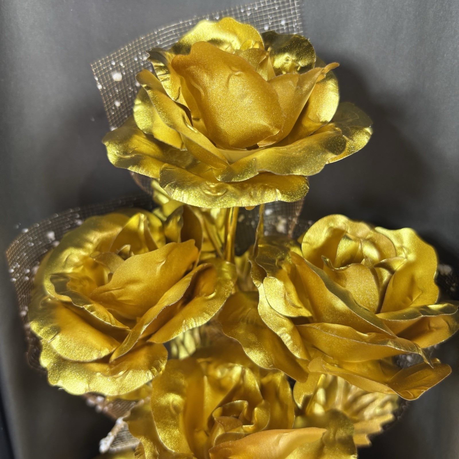 Gold-plated artificial rose bouquet in a black gift box