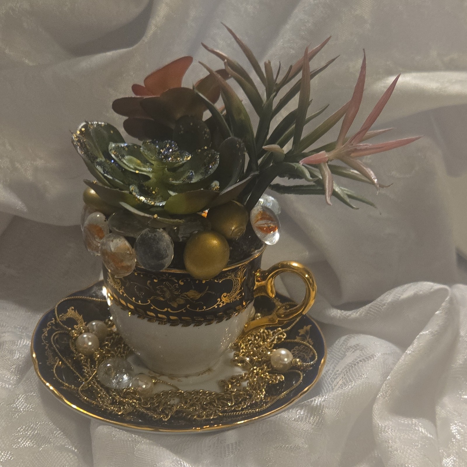 Artificial Succulent Floral Arrangement Ceramic Teacup & Saucer, Beads Chain