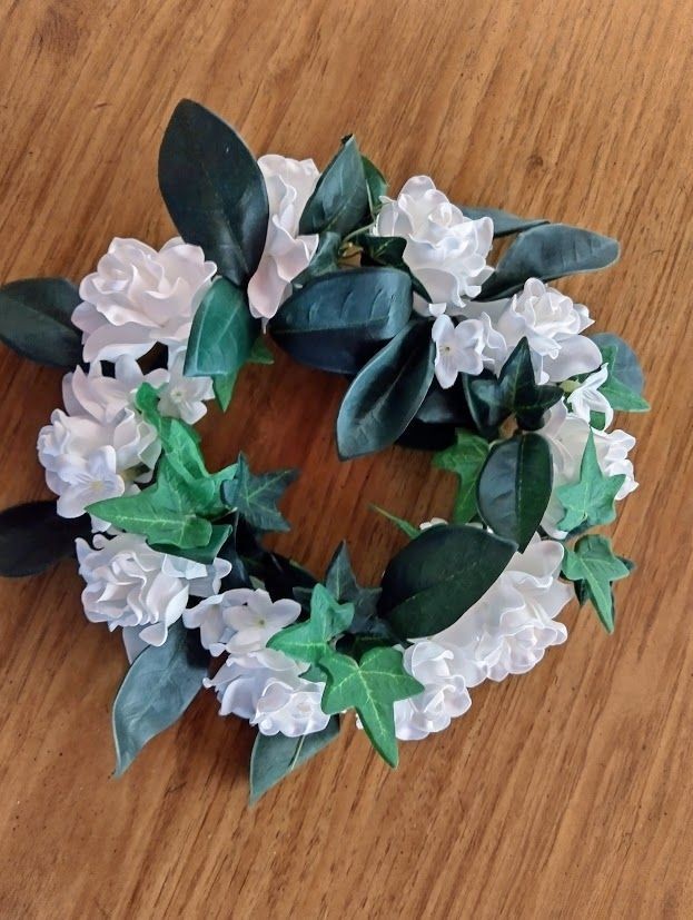 REAL TOUCH Gardenia candle ring for a 6″ pillar candle or cremation urn.