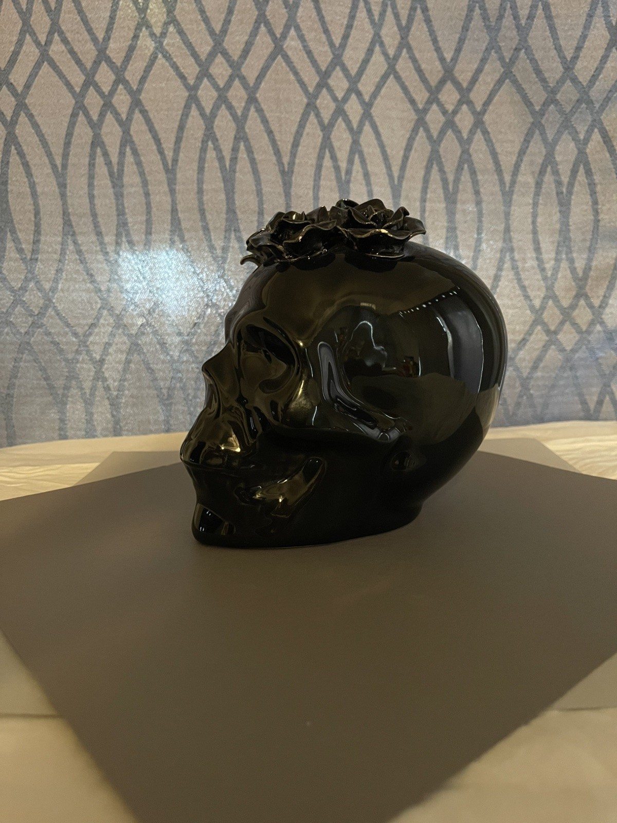 black glossy skull decoration with faux black roses