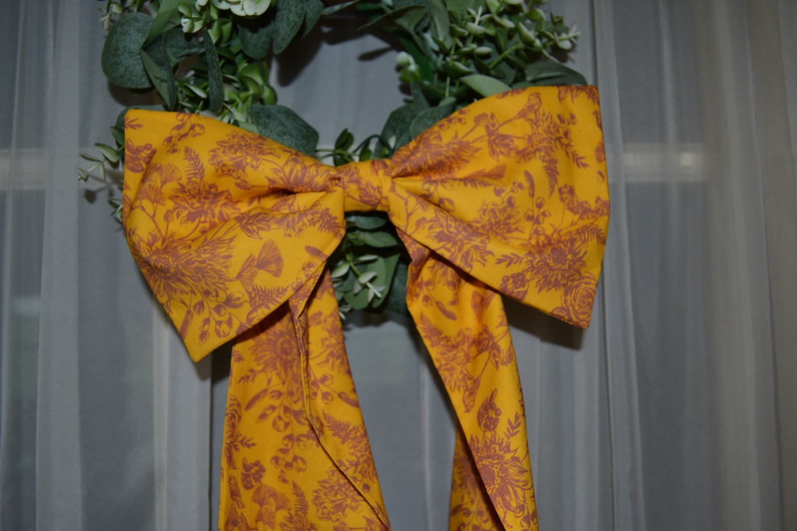 Wreath Sash with bow is Made In A Sunflower Toile Cotton Fabric Yellow In Color