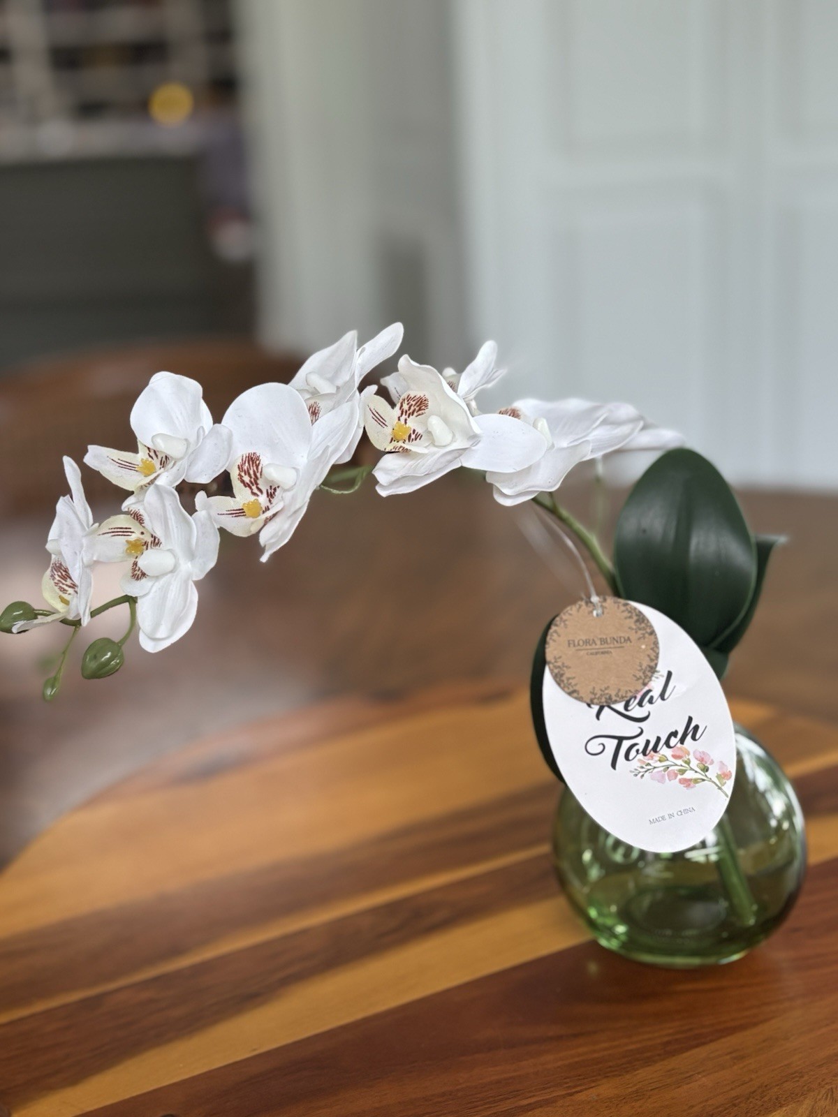 Flora Bunda Real Touch Artificial White Orchid Arrangement Green Glass Vase