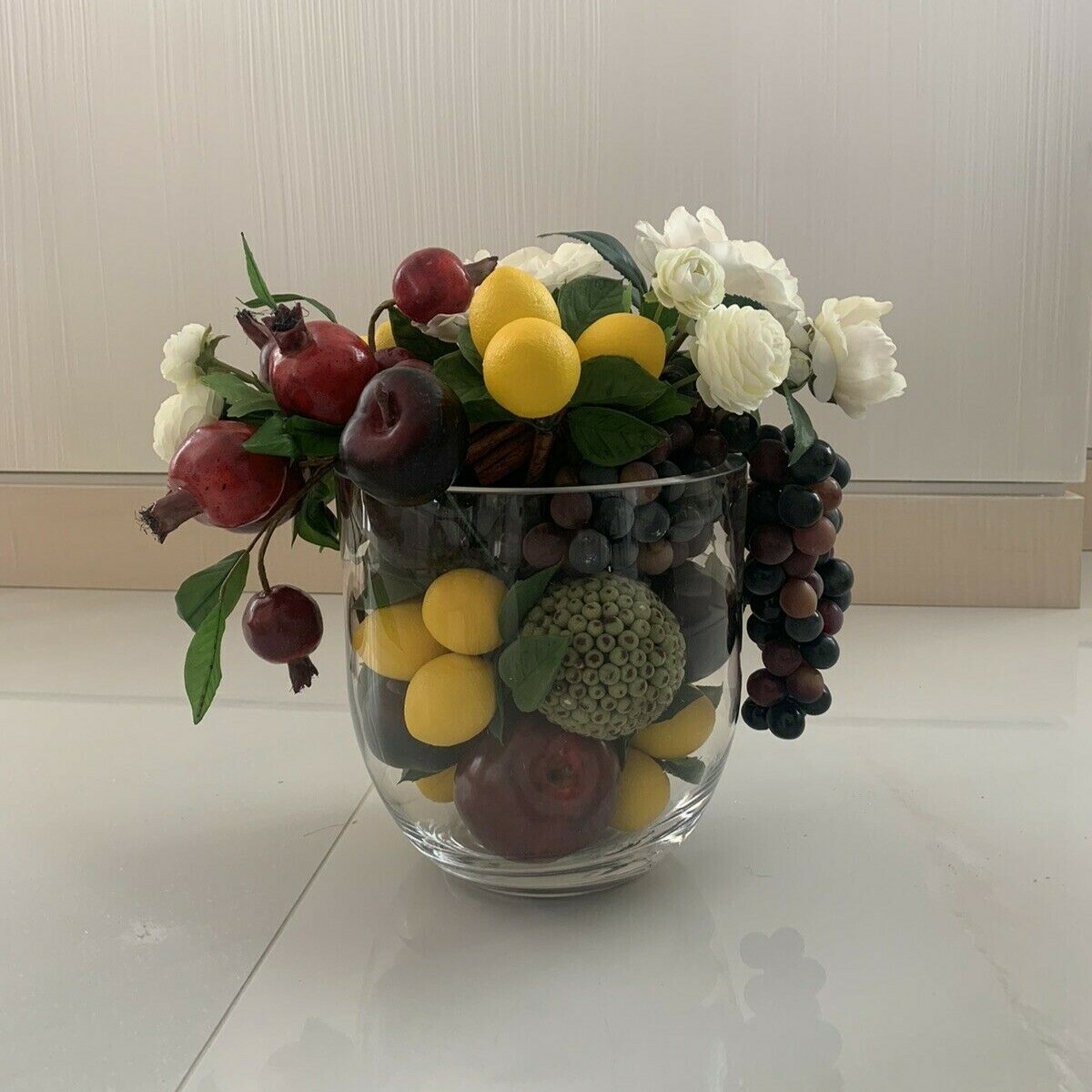 Pomegranate, Lemon, Grapes with Flower Centerpiece Arrangement with Clear Vase 