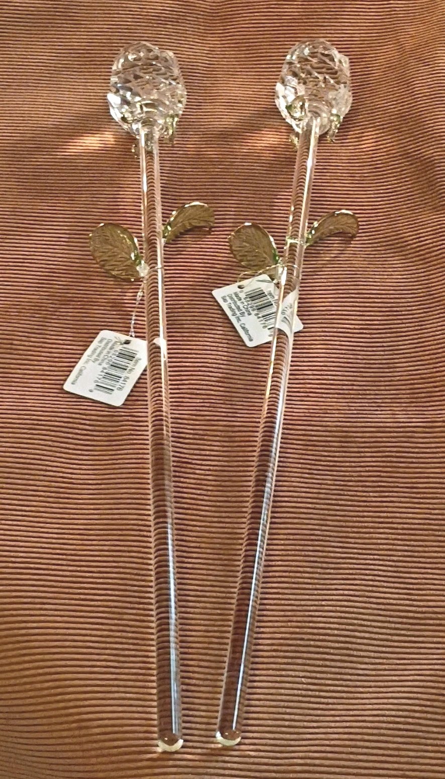 8 pc Hand blown Glass Roses with delicate green leaves on long stem.