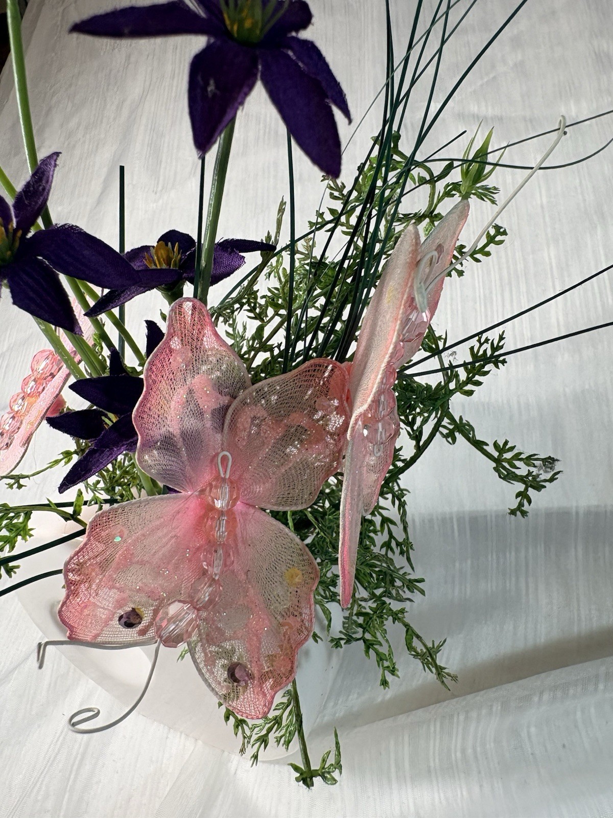 Artificial Purple Flower Arrangement with Pink Butterfly in White Ceramic Vase