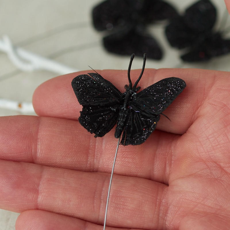 Package of 12 Miniature 1-1/4″ Black Glitter Artificial Butterflies
