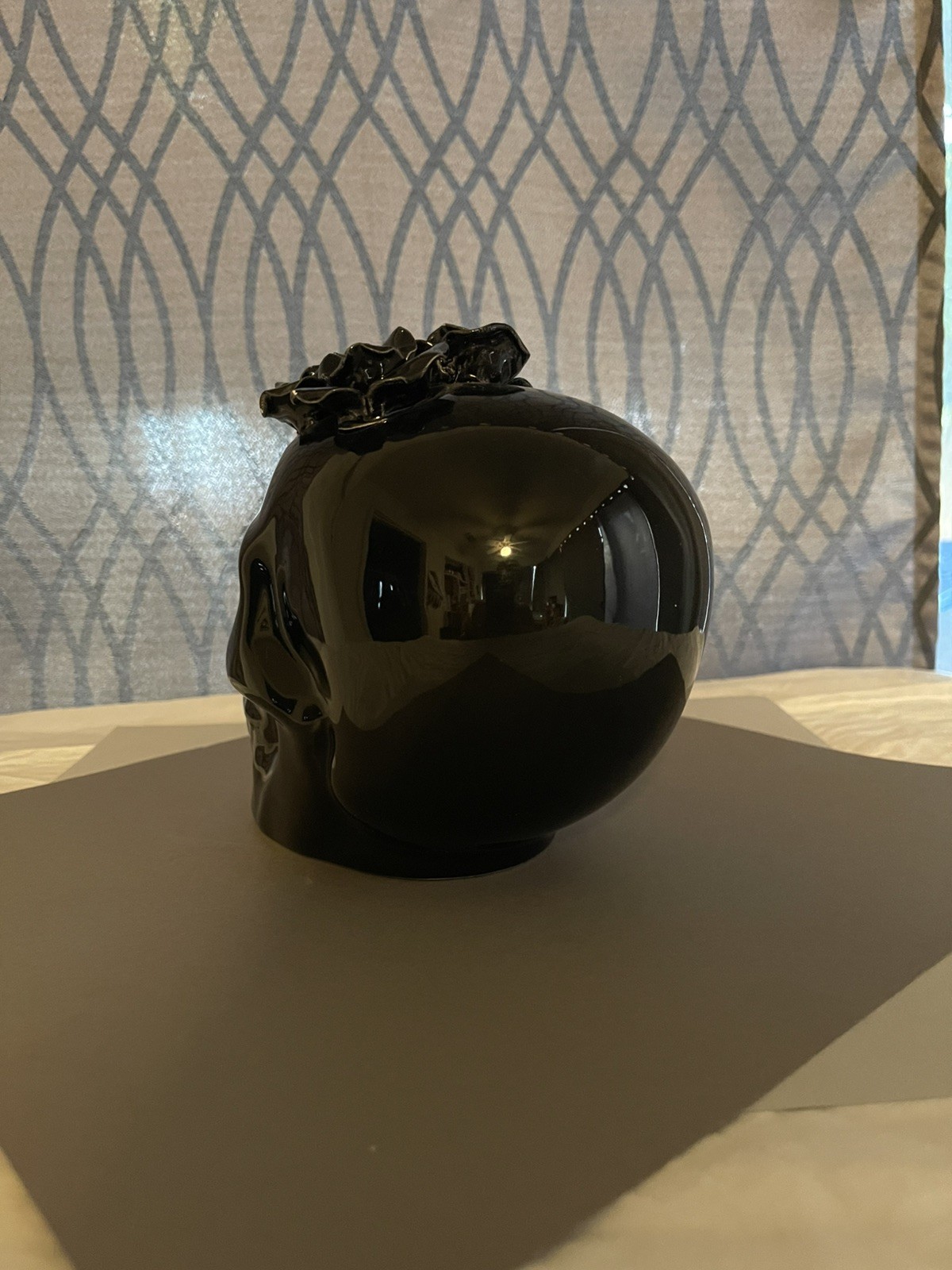 black glossy skull decoration with faux black roses
