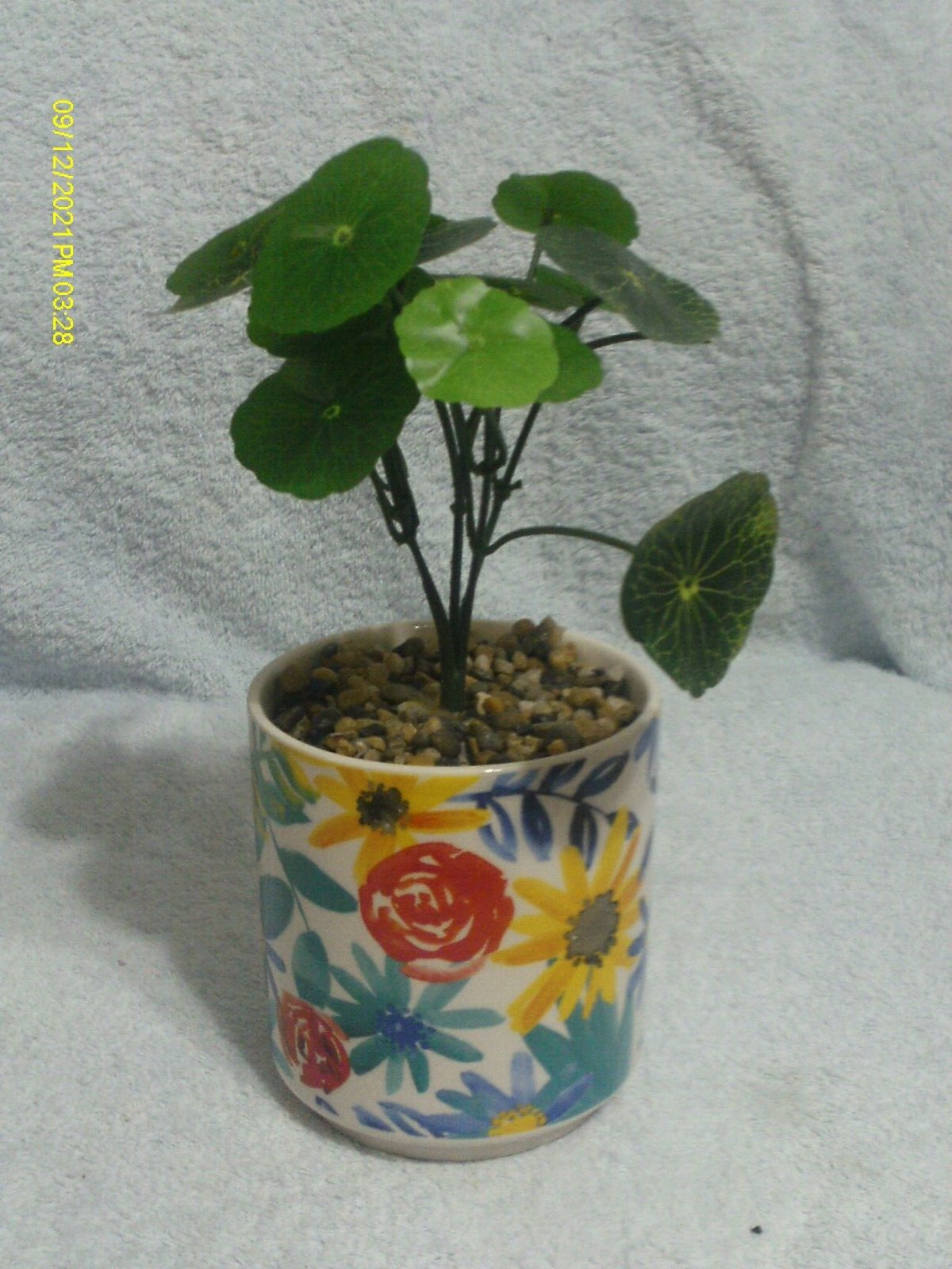 Faux Plant In Ceramic Floral Pot With Stones
