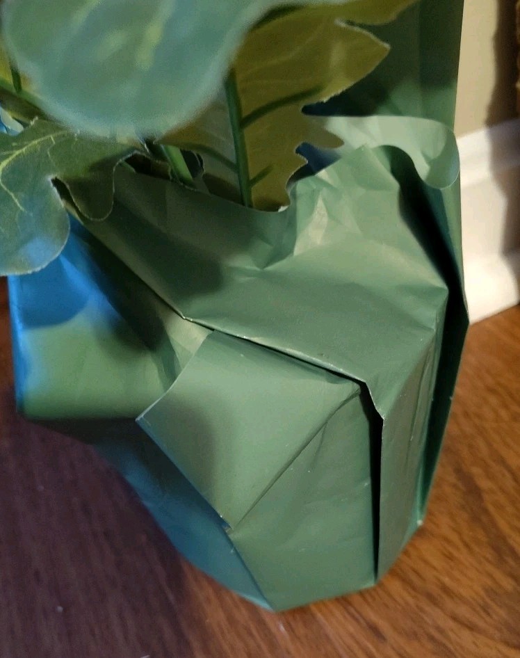 Artificial White Daisy In Pot With Paper