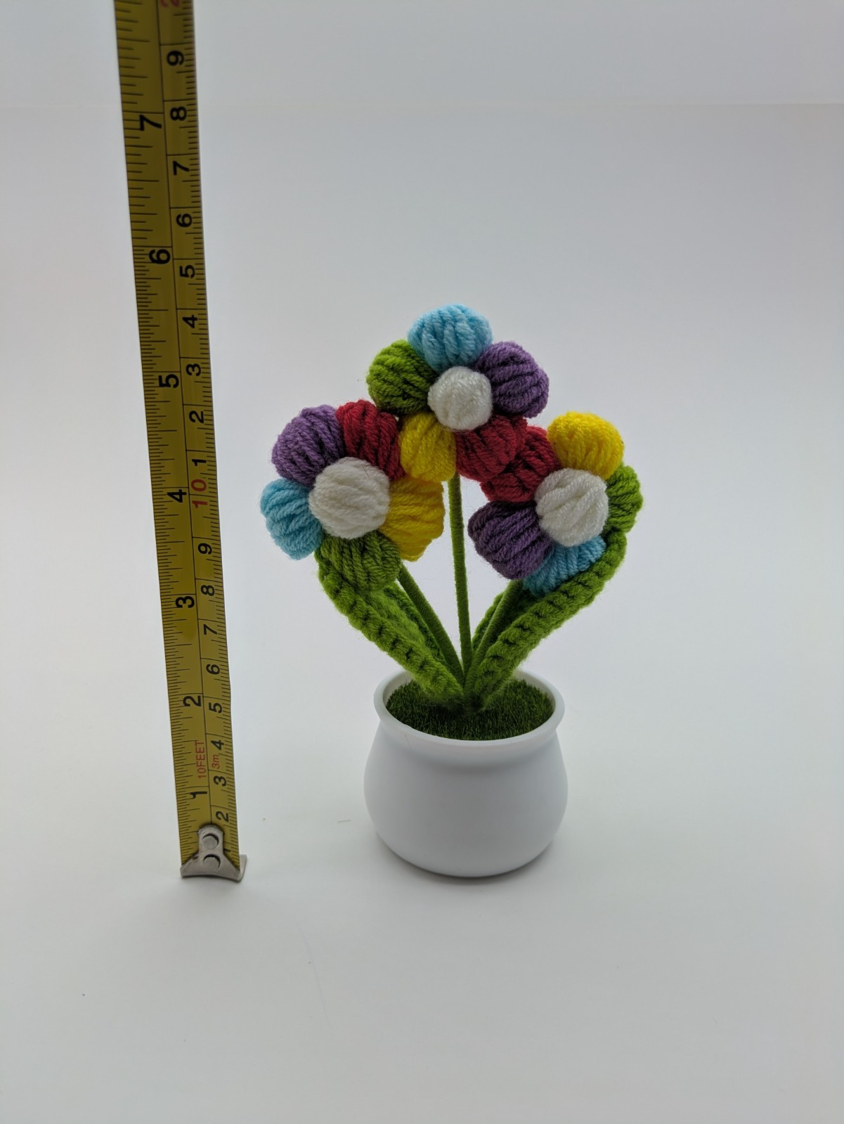 Hand Made Yarn Crochet Rainbow Petal Flowers in White Plastic Pot