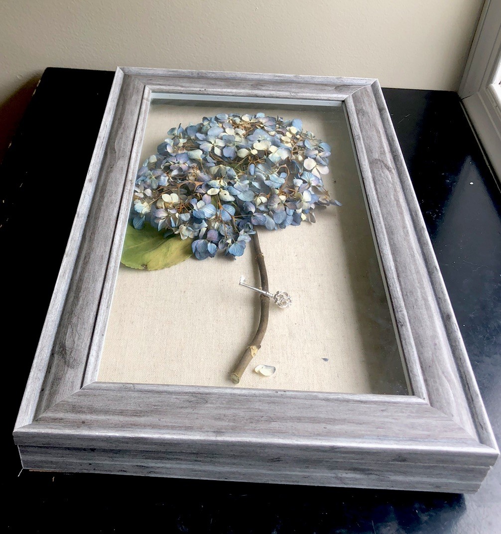 Real dried light blue hydrangea in wood frame 16”H x 10” W