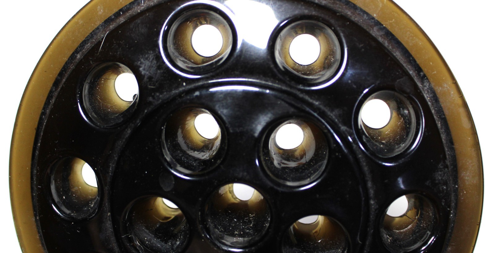 ANTIQUE DARK AMBER GLASS LARGE 16 HOLE ROUND GLASS FLOWER FRONG 5″ Diameter