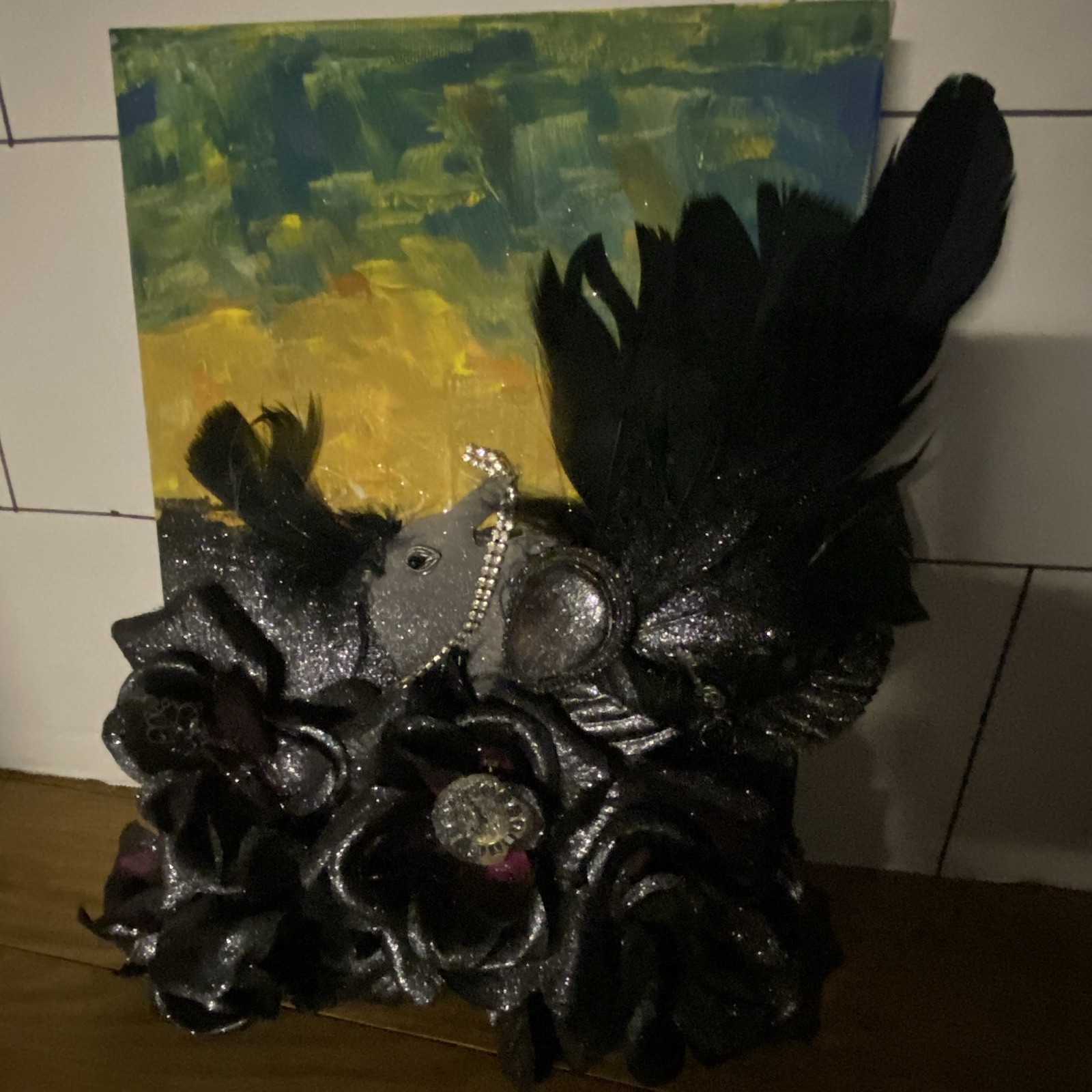 Silver/black crow w/jewels flower feather embellished
