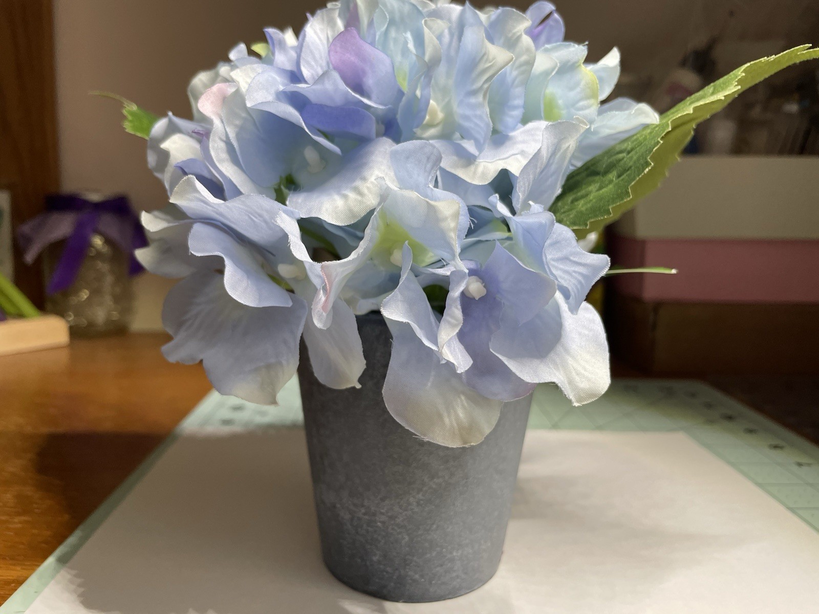 7 In Faux Blue Hydrangea In Paper Pot By Ashland 8 Pots Reg. Price $9.99 Each
