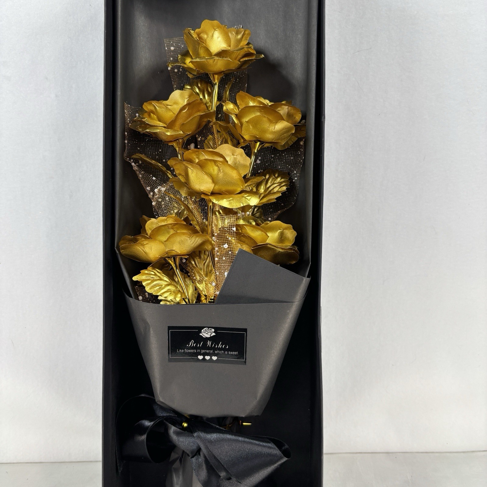 Gold-plated artificial rose bouquet in a black gift box