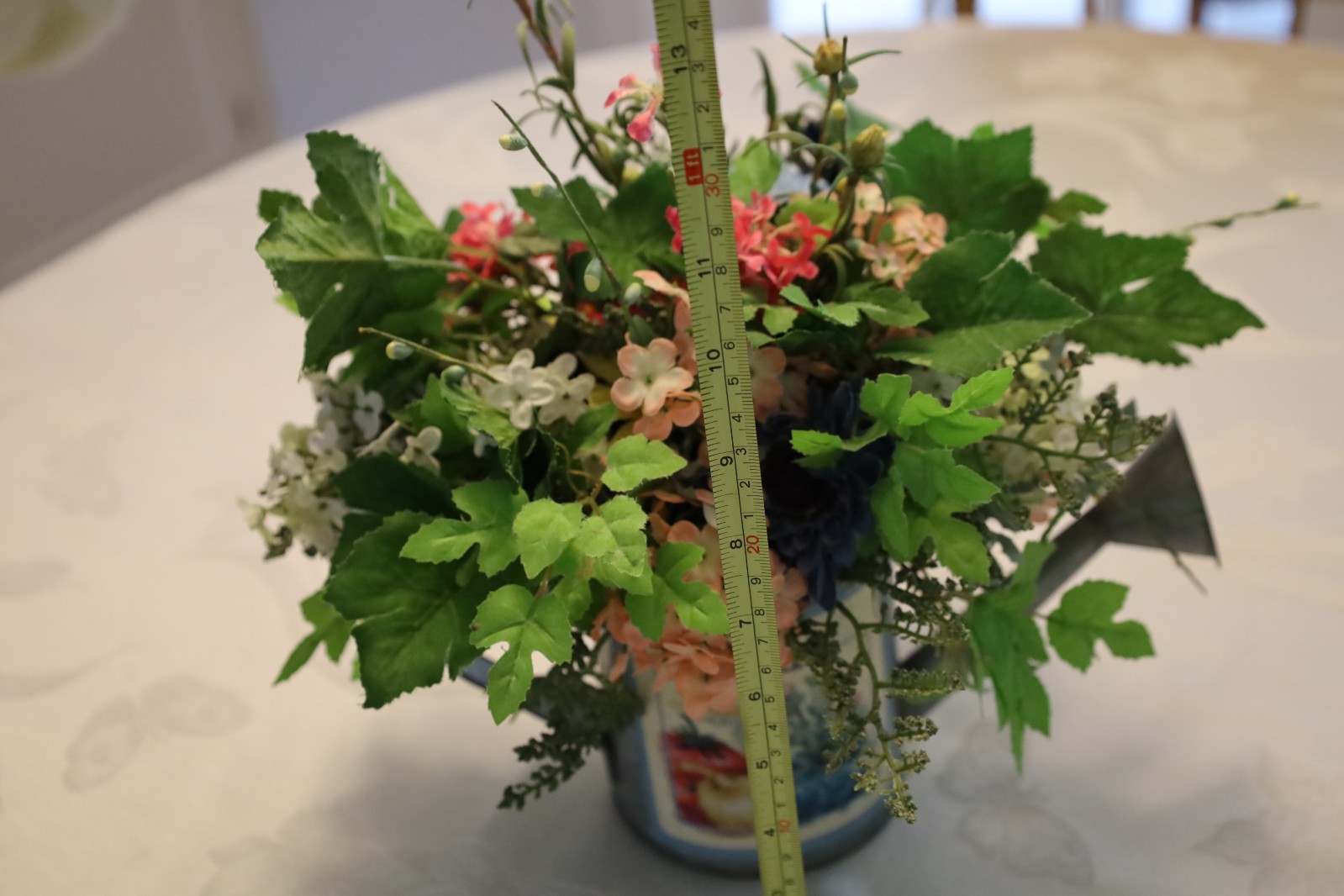 Spring Multicolor Artificial Floral in a Watering Can Table Decoration