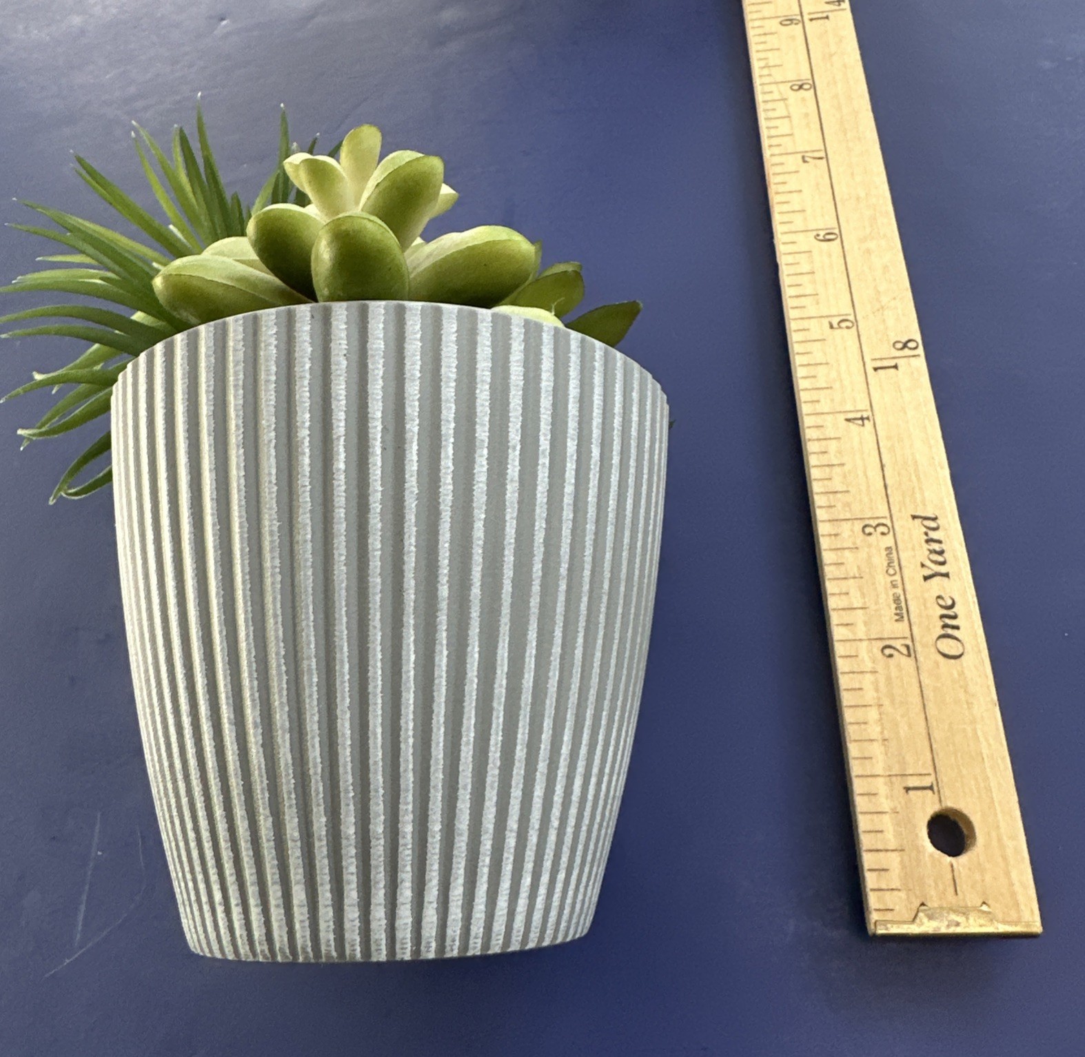 SWEET ARTIFICIAL SUCCULENT PLANTS IN GRAY POT